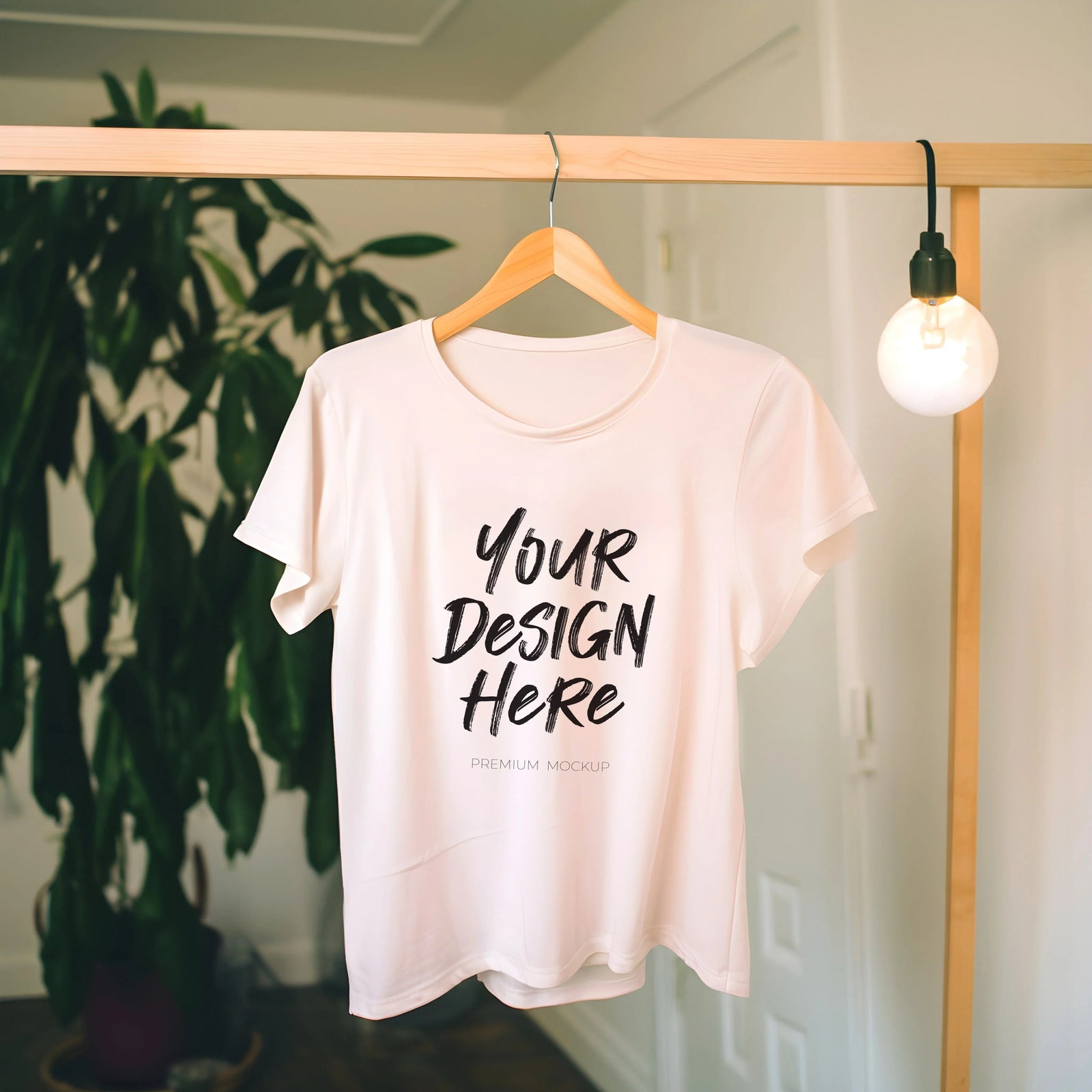 entrepreneur holding up tshirt with created dtf design